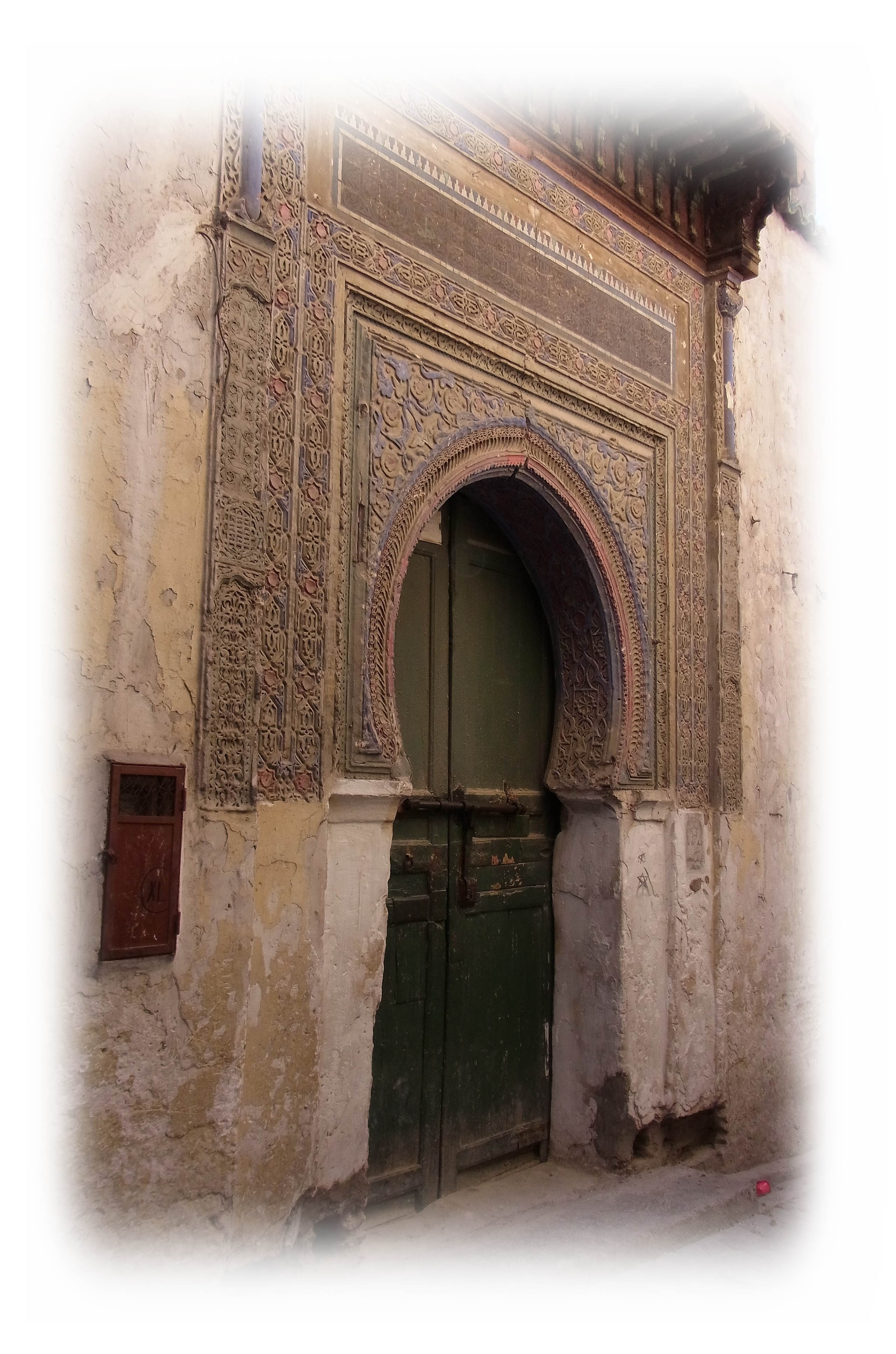 Intricate carvings of the entrance of Dar Bensouda