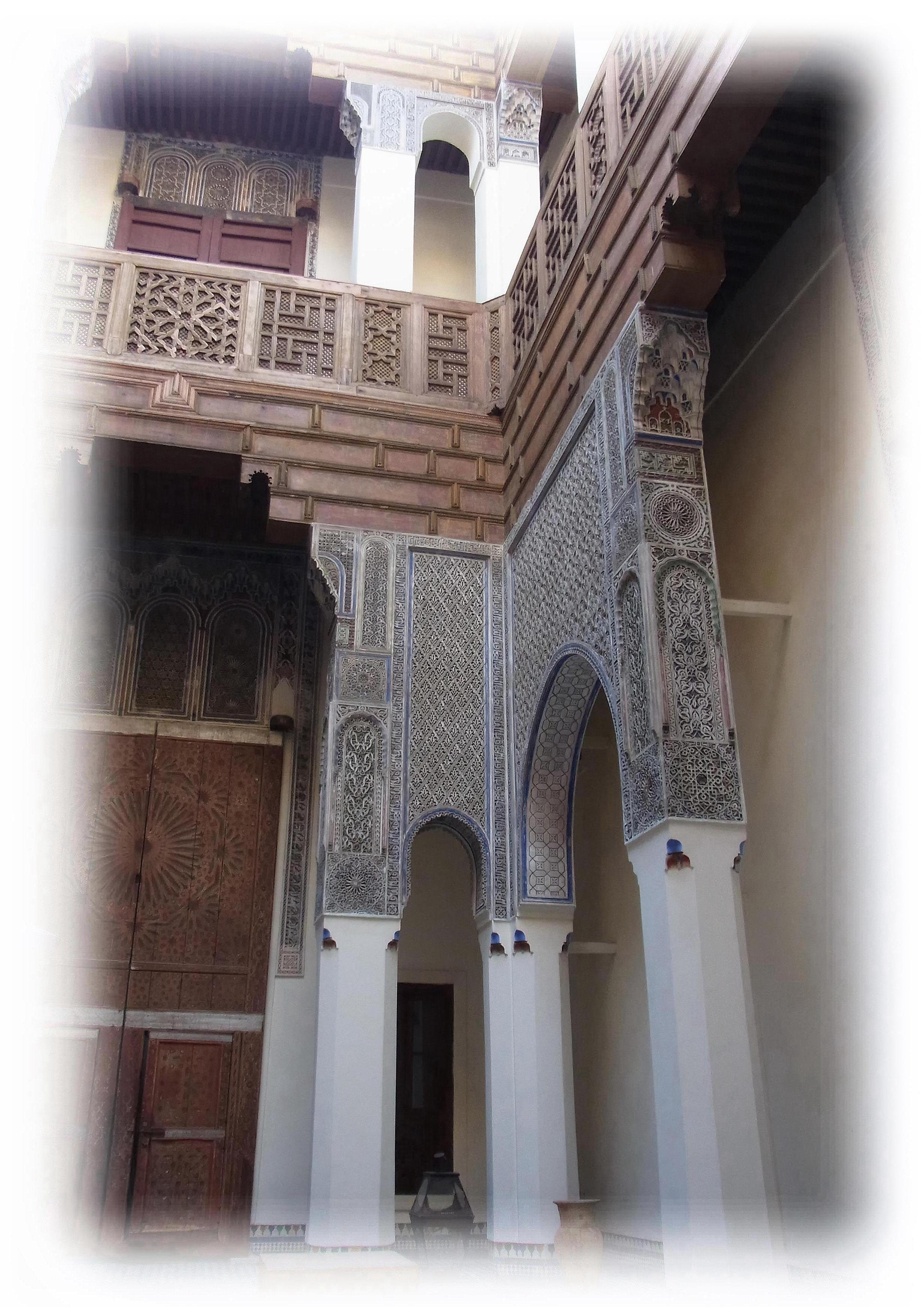 Intricate carvings on the walls of Dar Bensoda